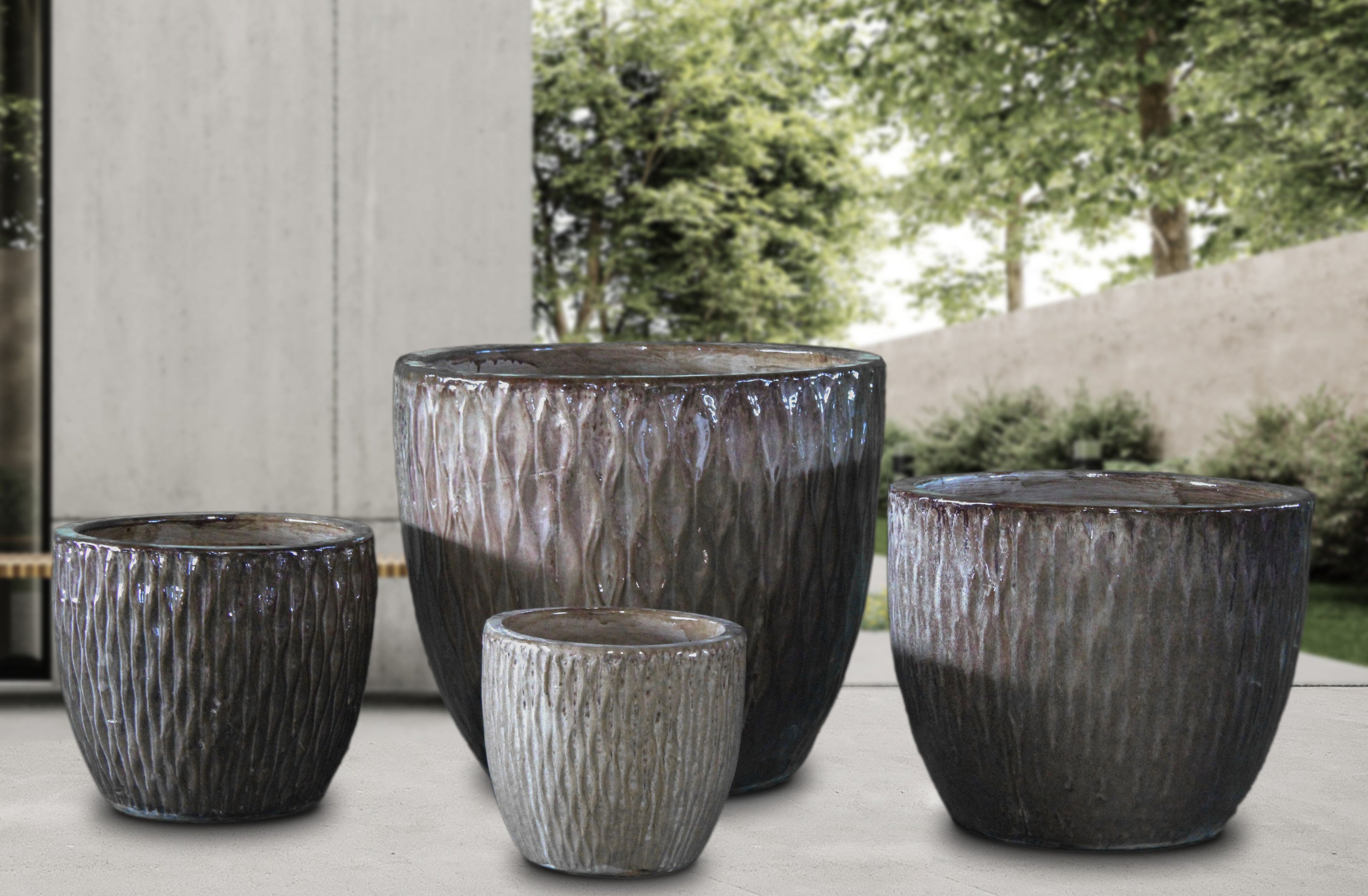 CAPPUCHINO_INFINITY_PLANTERS - Cast Stone International 